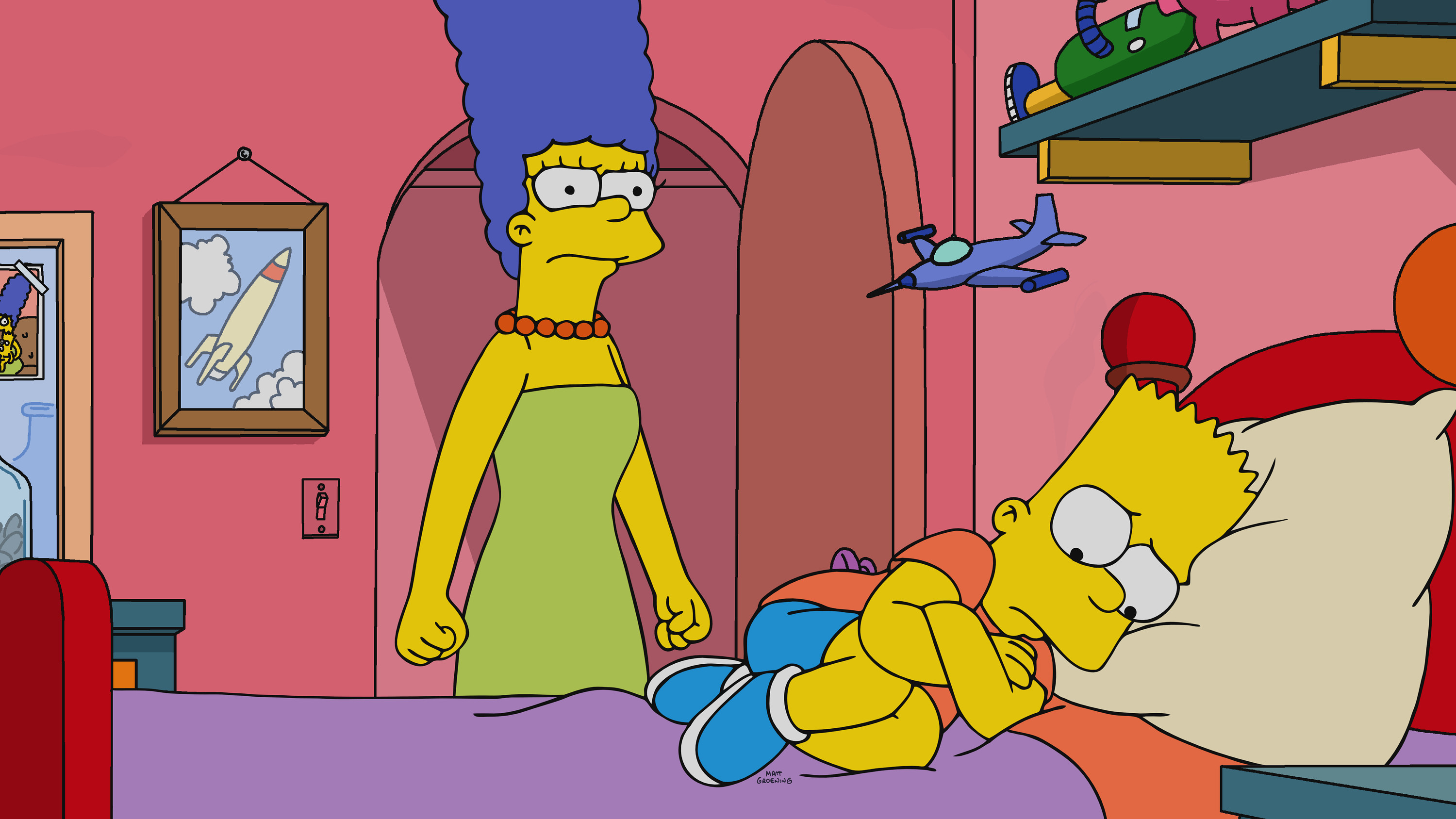 Marge in bed scrolller