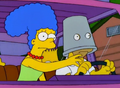 Homer Driving with Bucket.png