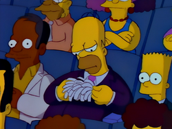 Homer playing with paper.png