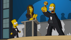 Homer accepts the award.png